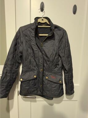 Barbour Quilted Utility Jacket in Black with Brass Details